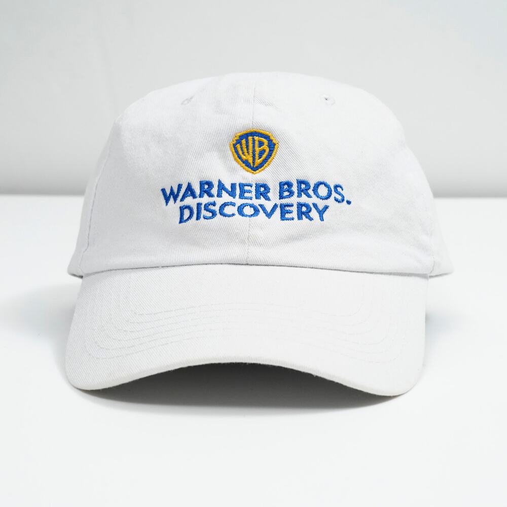 Warner Bros Discovery White Adjustable Baseball Cap Embroidered Logo Hat